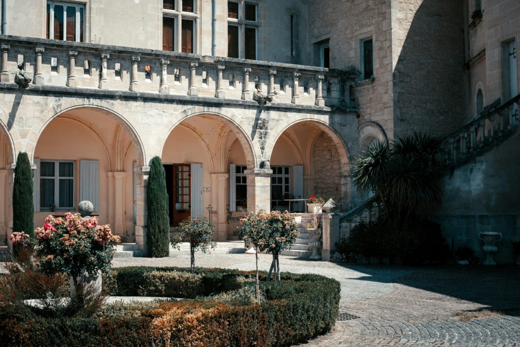 a building with a garden in front