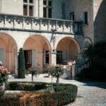 a building with a garden in front